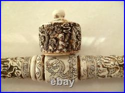 Collection of decorative Chinese hand-carved dragons Old pipe