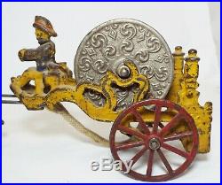 RARE Old Antique Yellow Cast Iron TOY FIRE ENGINE TRUCK With HOSE REEL & DRIVER